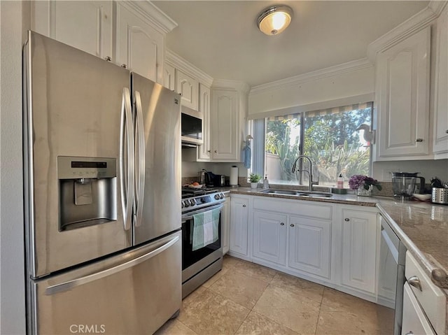 kitchen featuring stainless steel appliances, white cabinetry, sink, and crown molding