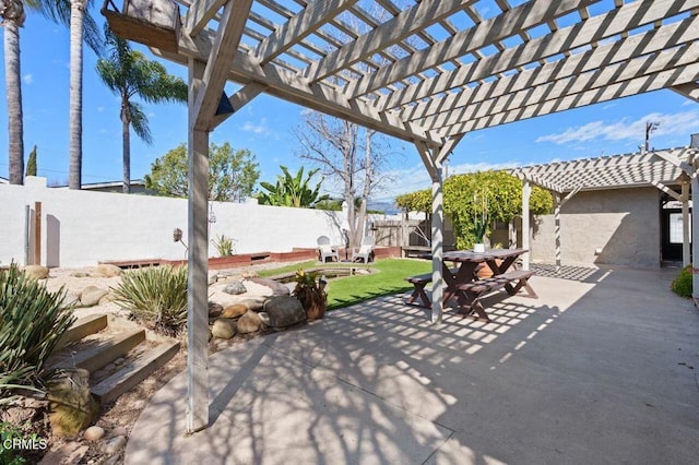 view of patio with a fenced backyard and a pergola