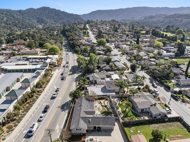 drone / aerial view with a residential view and a mountain view