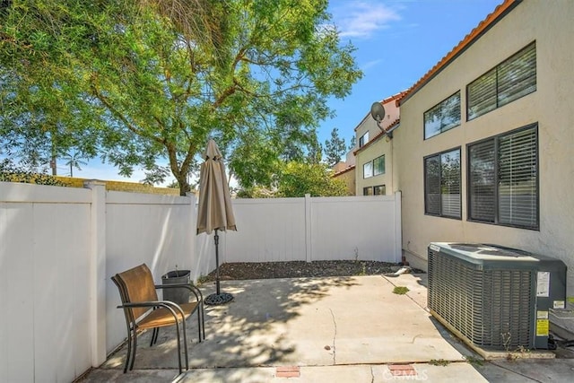 8556 Baldy Vista Dr, Rancho Cucamonga, CA 91730 - view of patio featuring a fenced backyard and central AC