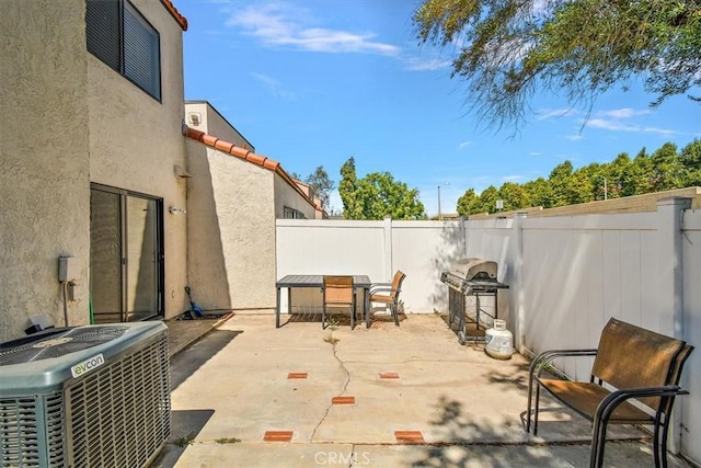 8556 Baldy Vista Dr, Rancho Cucamonga, CA 91730 - view of patio with central AC, grilling area, and a fenced backyard