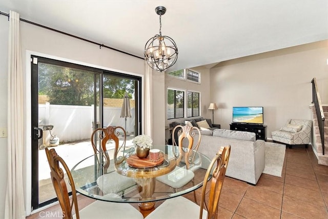 8556 Baldy Vista Dr, Rancho Cucamonga, CA 91730 - dining space with tile patterned floors and an inviting chandelier