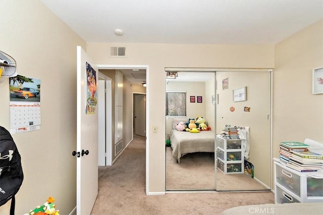 8556 Baldy Vista Dr, Rancho Cucamonga, CA 91730 - bedroom featuring attic access, carpet flooring, a closet, and visible vents