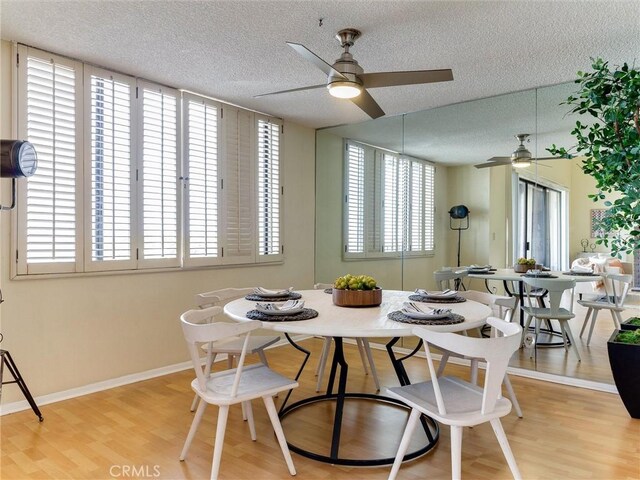 1923 Molino Ave Unit 303, Signal Hill, CA 90755 - dining room featuring a ceiling fan, a textured ceiling, wood finished floors, and baseboards