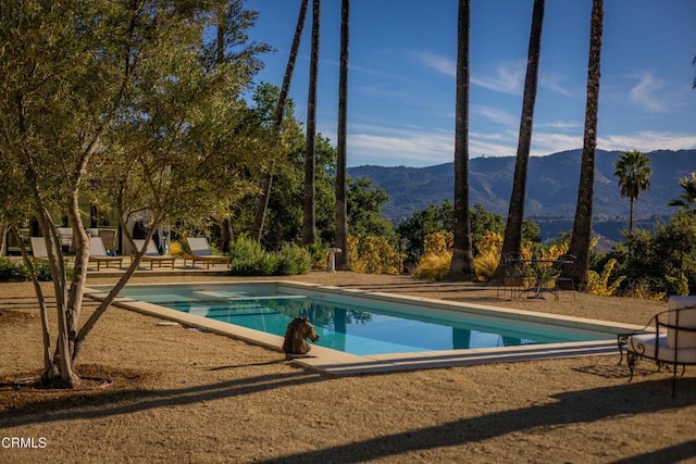 view of pool featuring a mountain view