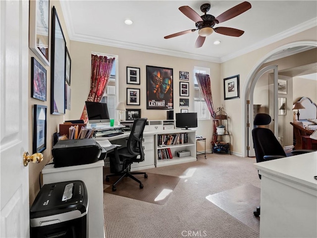 office area with crown molding, light colored carpet, and ceiling fan