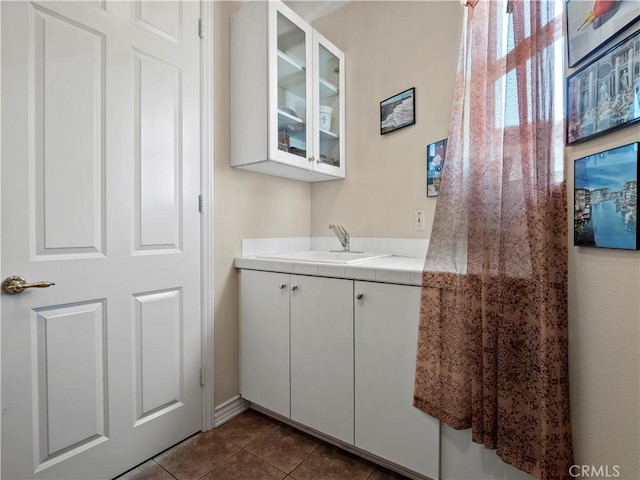 bathroom featuring vanity and tile patterned floors