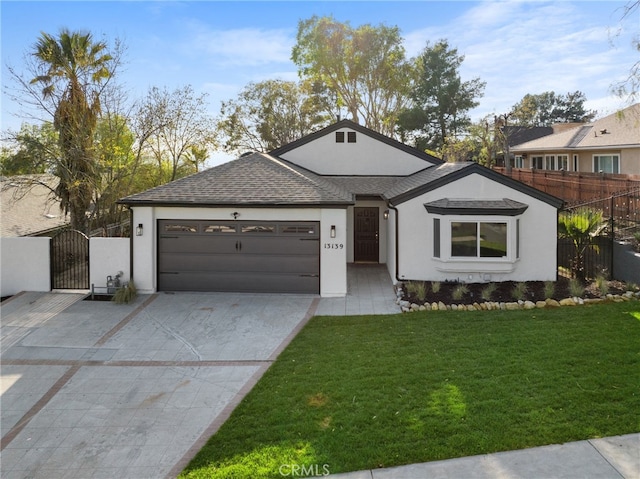 ranch-style home with a garage and a front yard