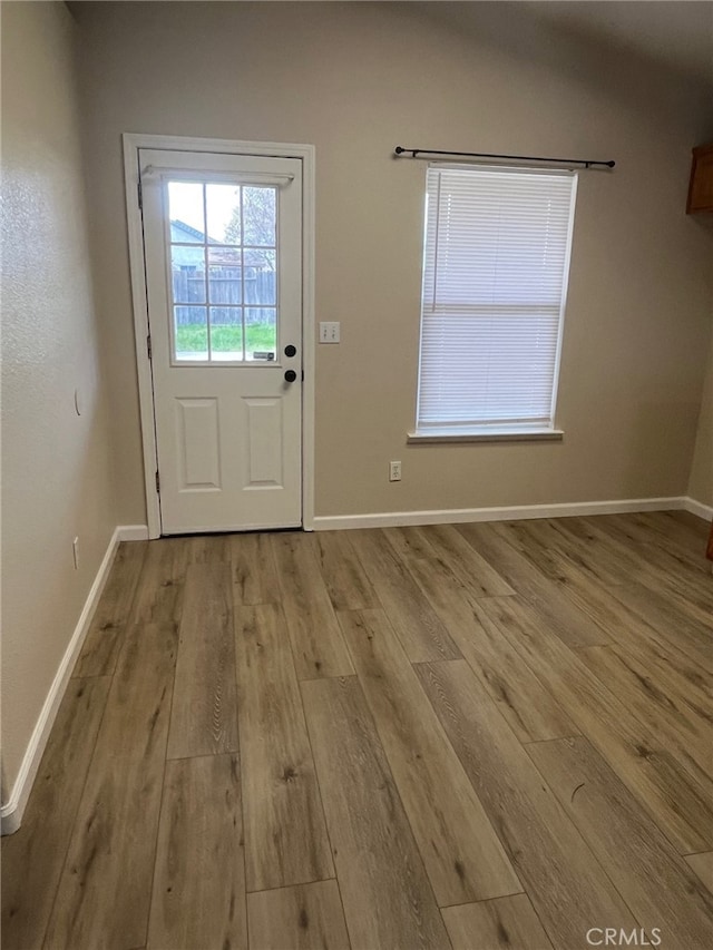 doorway featuring light hardwood / wood-style floors