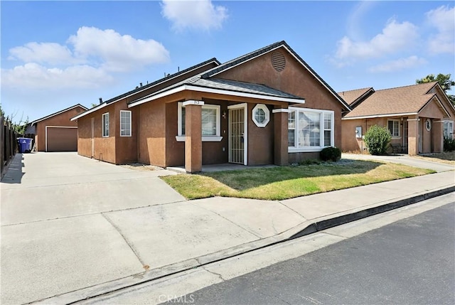 713 Vista Del Rey Dr, Atwater, CA 95301 - ranch-style home with stucco siding, a garage, a front yard, and concrete driveway