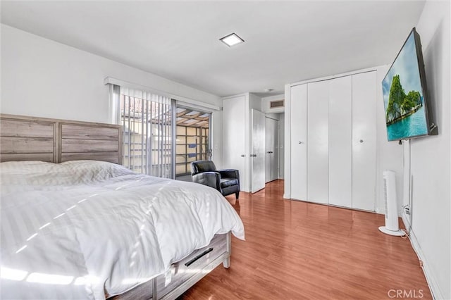 bedroom featuring hardwood / wood-style floors