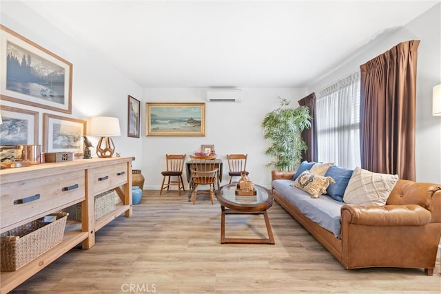 interior space featuring light hardwood / wood-style floors and a wall unit AC