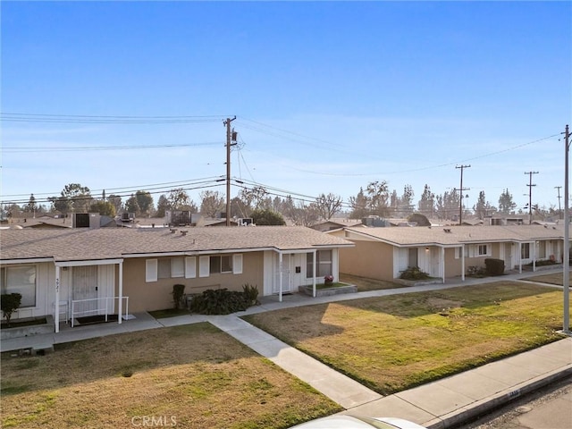 view of front of house with a front lawn