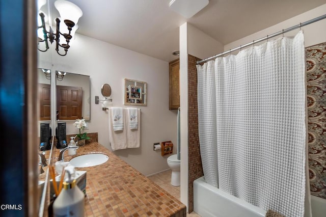 full bath with toilet, a notable chandelier, tile patterned floors, vanity, and shower / tub combo with curtain