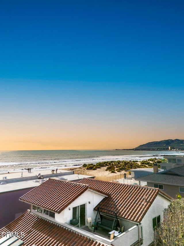 exterior space with a beach view