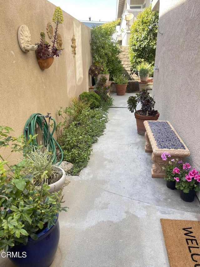 view of yard featuring a patio area and fence