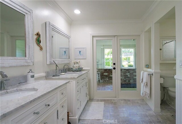 17 Barkentine Rd, Rancho Palos Verdes, CA 90275 - bathroom with crown molding, vanity, toilet, and french doors