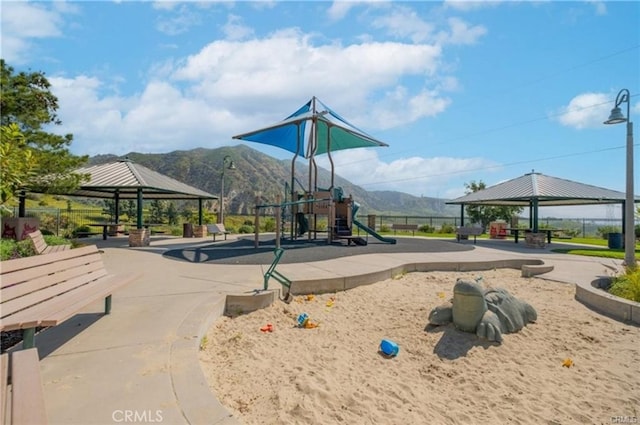 view of play area with a gazebo and a mountain view