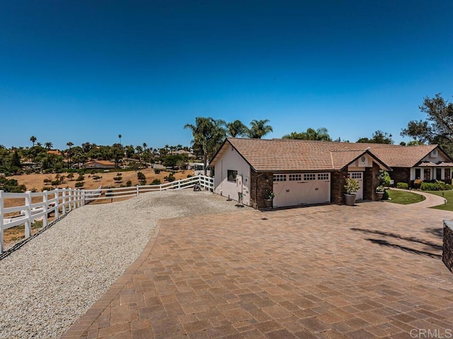 view of front of property with a garage