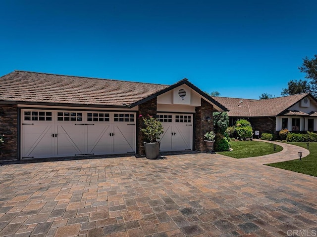 view of front of property with a garage