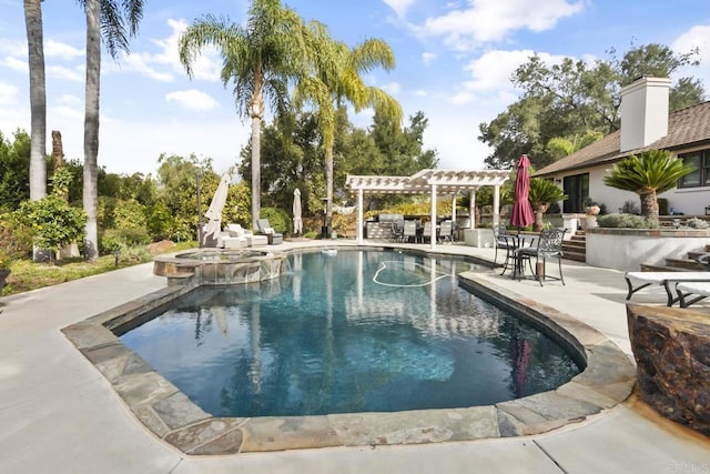 view of pool featuring an in ground hot tub, a patio, and a pergola