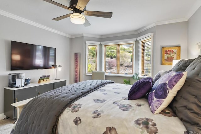 bedroom featuring ceiling fan and ornamental molding