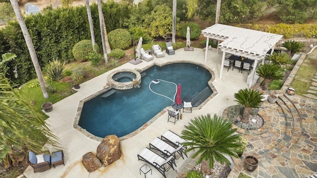 view of swimming pool with an in ground hot tub, a patio area, and a pergola