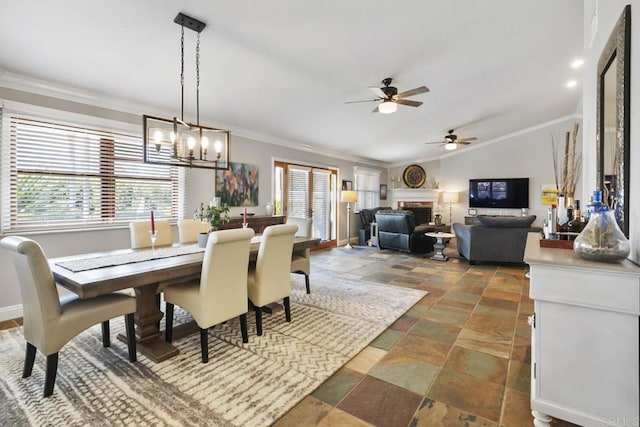 dining space featuring lofted ceiling, crown molding, and a chandelier