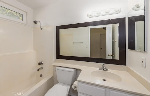 full bathroom with vanity, tub / shower combination, and toilet