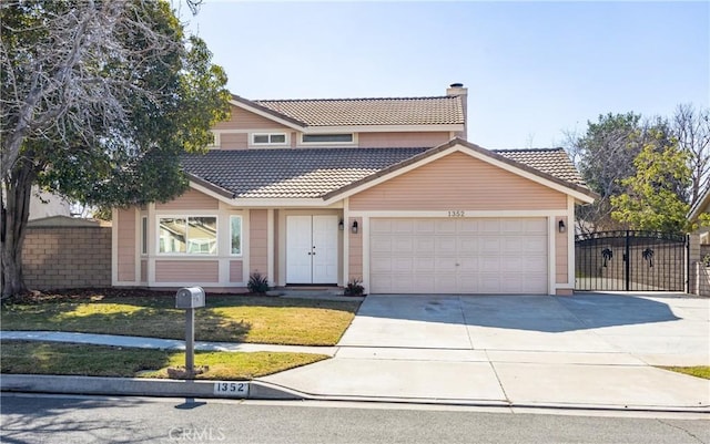 front of property featuring a garage