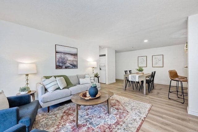 living room with light hardwood / wood-style floors