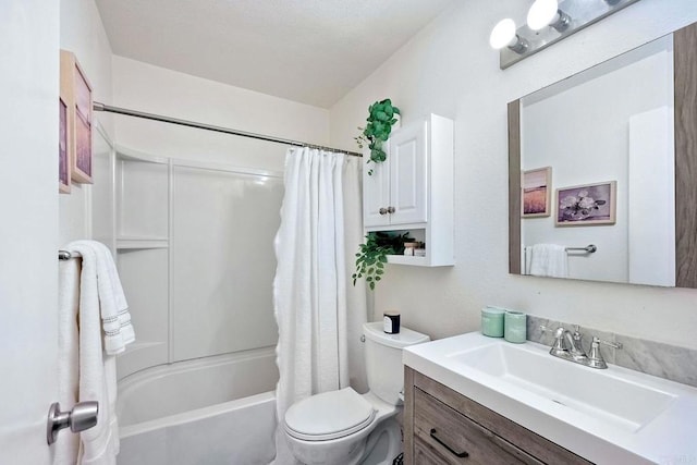 full bathroom featuring vanity, shower / tub combo, and toilet