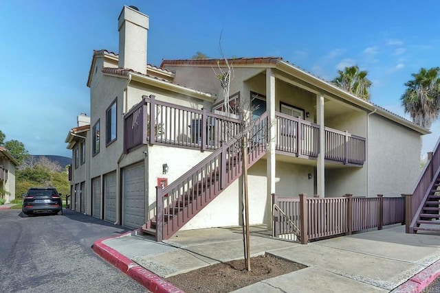 view of building exterior with a garage