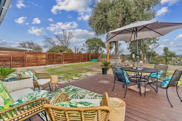 wooden deck with an outdoor hangout area