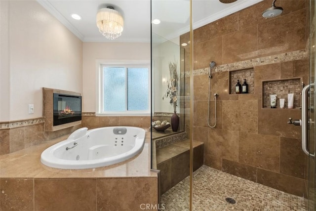 bathroom featuring crown molding and independent shower and bath