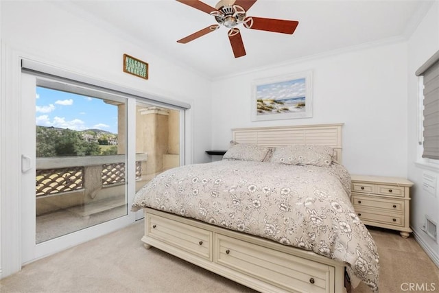 bedroom featuring crown molding, ceiling fan, light carpet, and access to outside