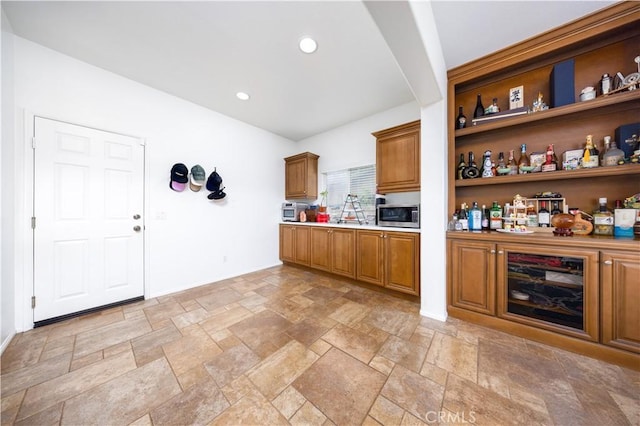 kitchen featuring stainless steel microwave