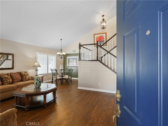 living room with dark wood-style floors, stairway, vaulted ceiling, a chandelier, and baseboards