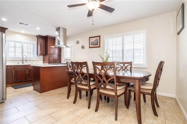 dining room featuring ceiling fan, recessed lighting, visible vents, and baseboards