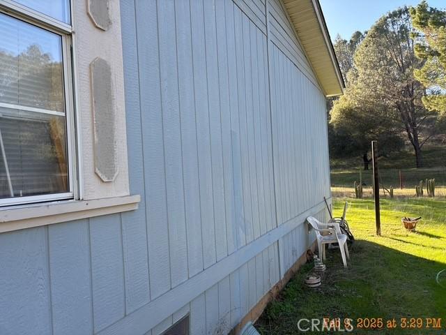1845 Spring Valley Rd, Clearlake Oaks, CA 95423 - view of home's exterior with a yard