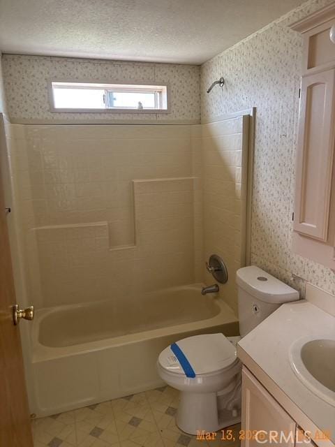 1845 Spring Valley Rd, Clearlake Oaks, CA 95423 - full bath featuring plenty of natural light, shower / bath combination, toilet, wallpapered walls, and vanity