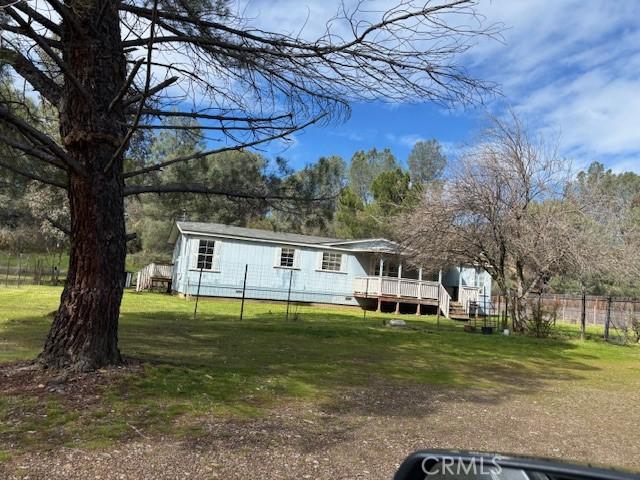 1845 Spring Valley Rd, Clearlake Oaks, CA 95423 - rear view of property with a wooden deck