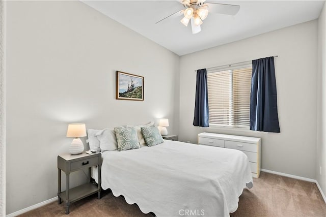 bedroom featuring dark carpet and ceiling fan