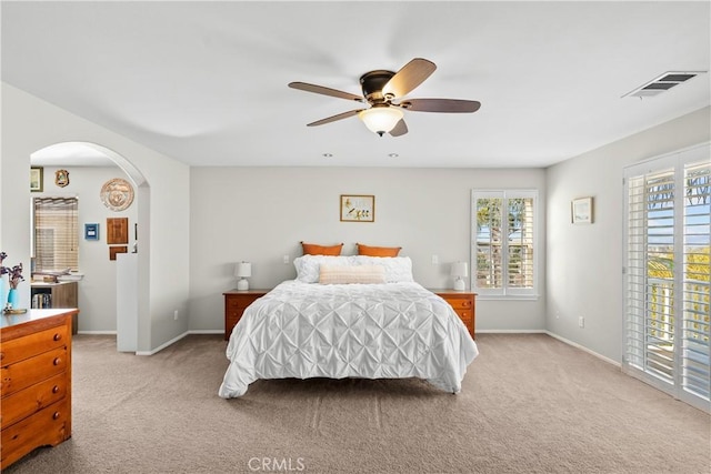 carpeted bedroom with access to outside and ceiling fan