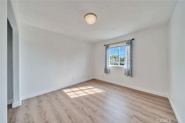 empty room featuring light hardwood / wood-style flooring