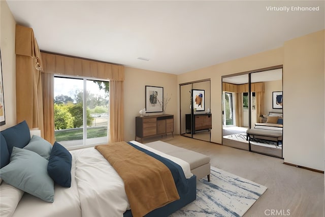 bedroom with access to exterior, two closets, and light colored carpet