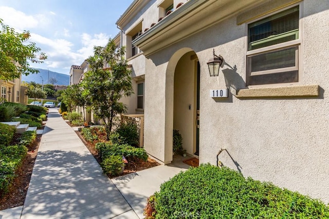 doorway to property with a mountain view