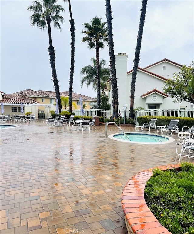 view of pool featuring a patio