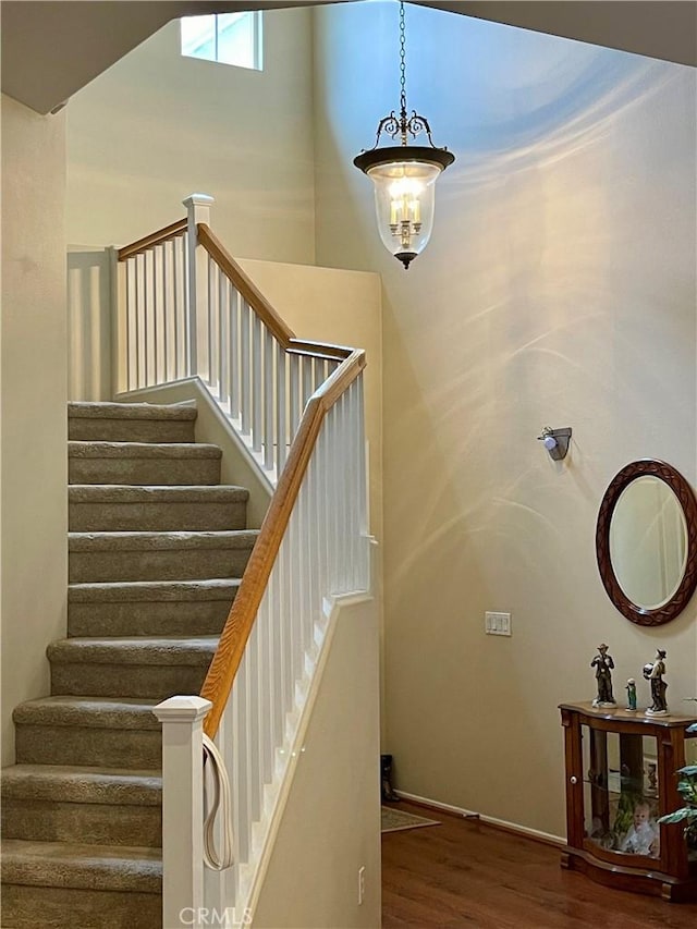 stairway with wood-type flooring