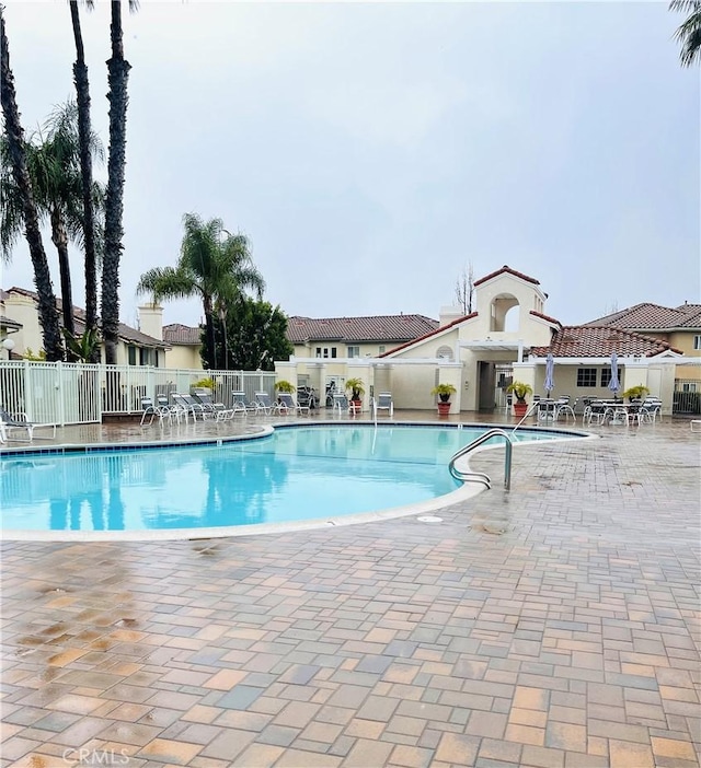 view of pool featuring a patio area